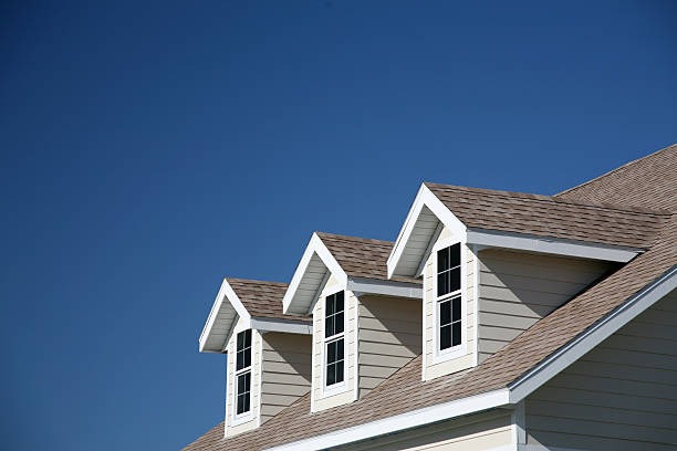 Archcraft Exteriors team working on a roof � trusted exterior contractors